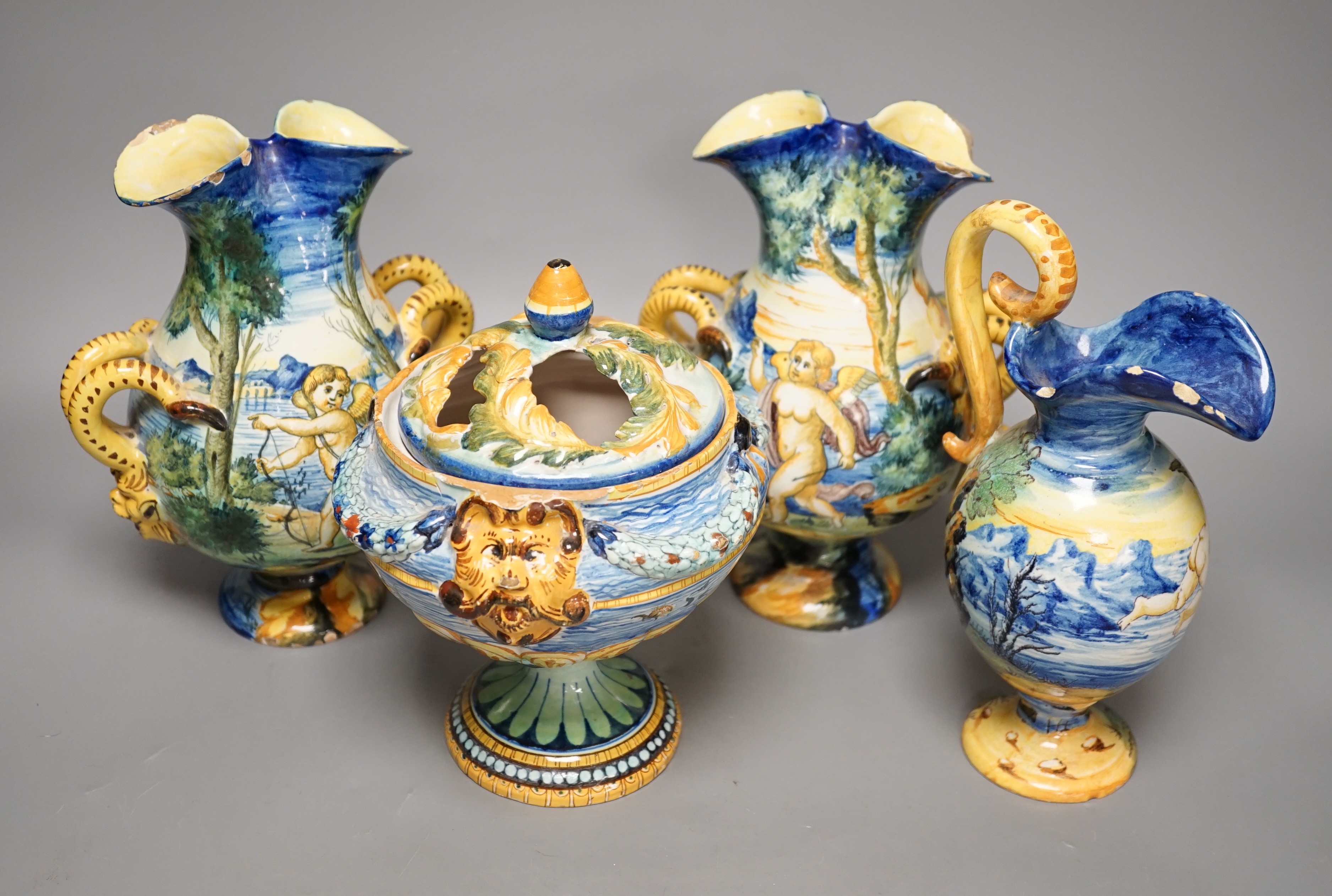 A pair of Cantagalli maiolica vases, a Cantagalli maiolica ewer and a similar potpourri. Tallest 21cm